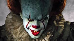 Pennywise the Dancing Clown staring Manically at the camera